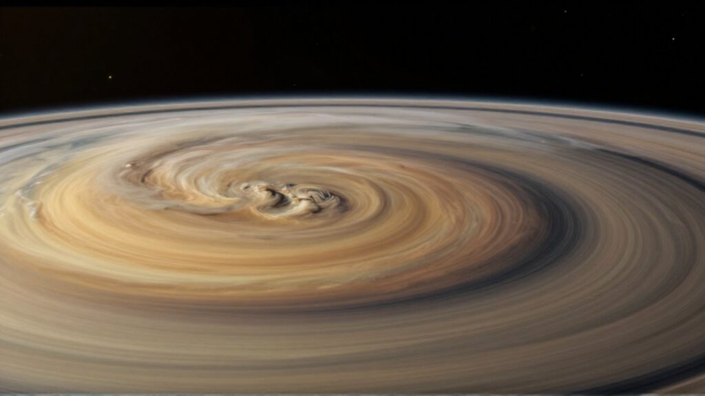 Vista cinematográfica de los tonos dorados y tormentas masivas que envuelven la atmósfera de Saturno.
